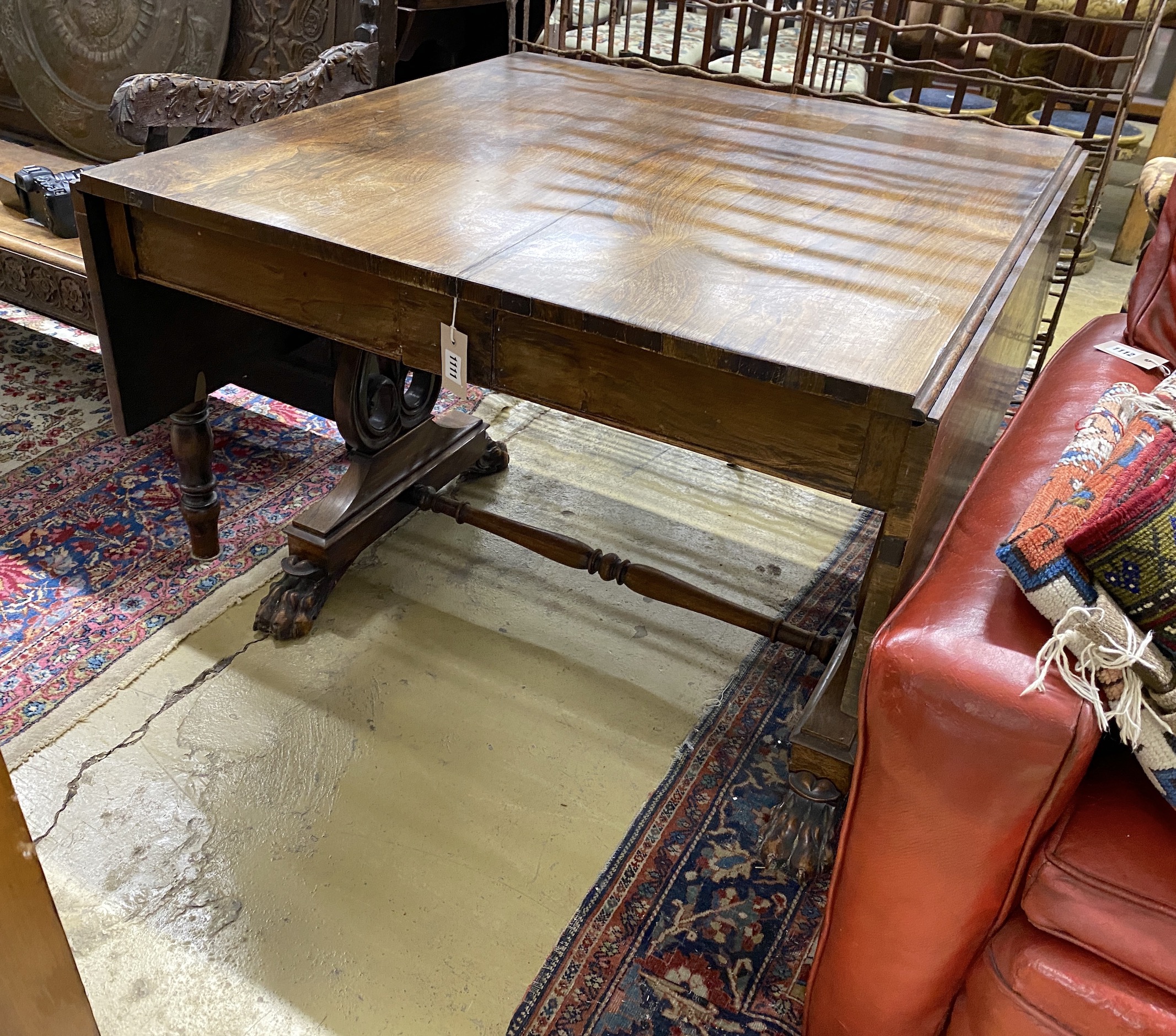 A George IV rosewood sofa table, with claw feet, width 93cm, depth 91cm, height 71cm